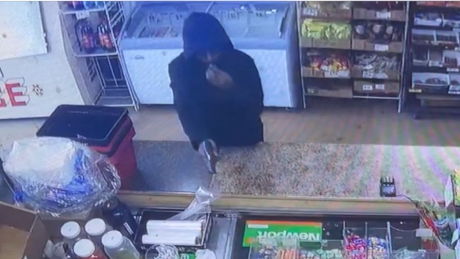 Robber Owner Police release photo of suspect accused of murdering grocery store ...