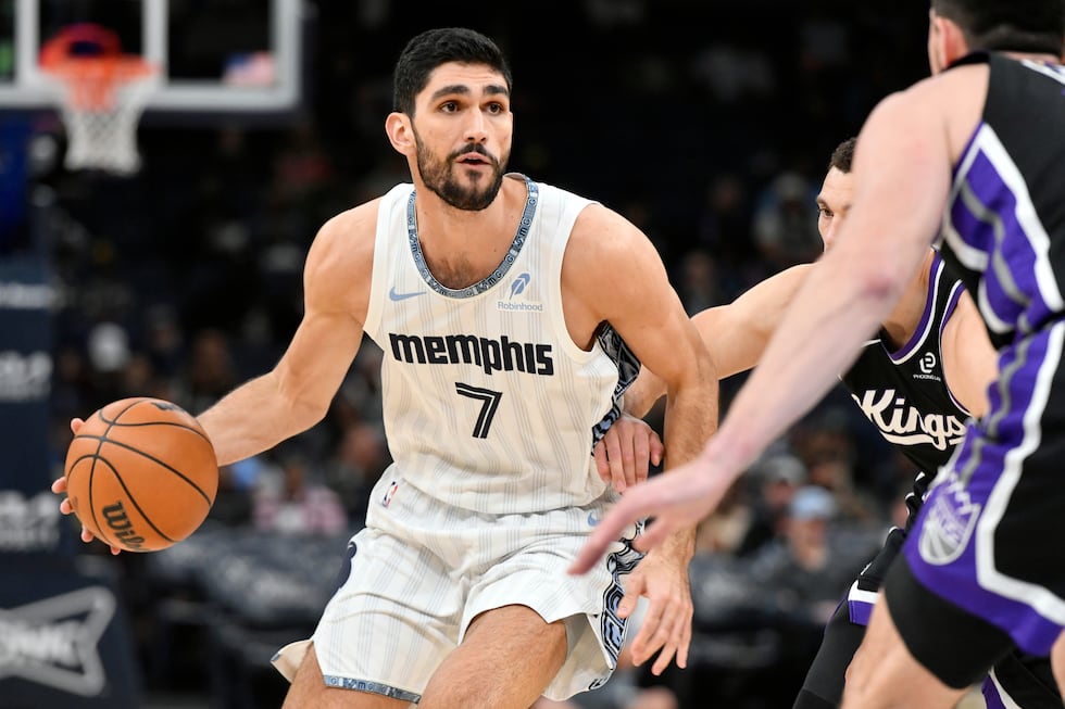 Memphis Grizzlies forward Santi Aldama (7) handles the ball against Sacramento Kings guard...