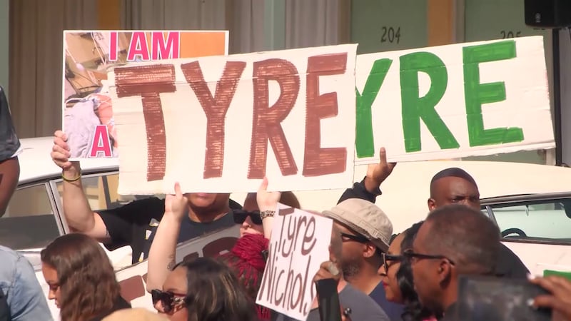 Community members rally for Tyre Nichols outside the National Civil Rights Museum, one day...