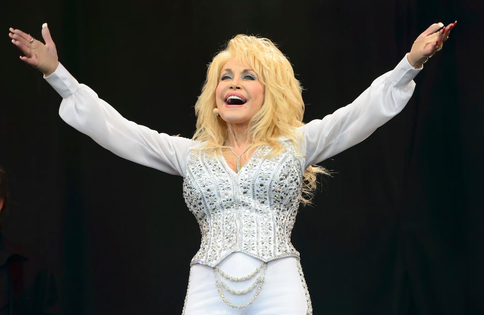 FILE - Dolly Parton performs at Glastonbury music festival, June 29, 2014. (Photo by Jonathan...
