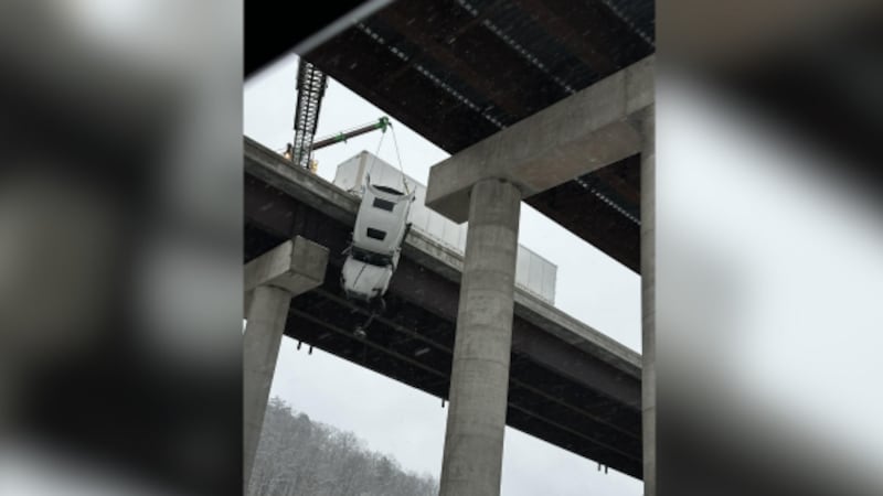 The driver of truck in West Virginia was saved after his vehicle went over an overpass.