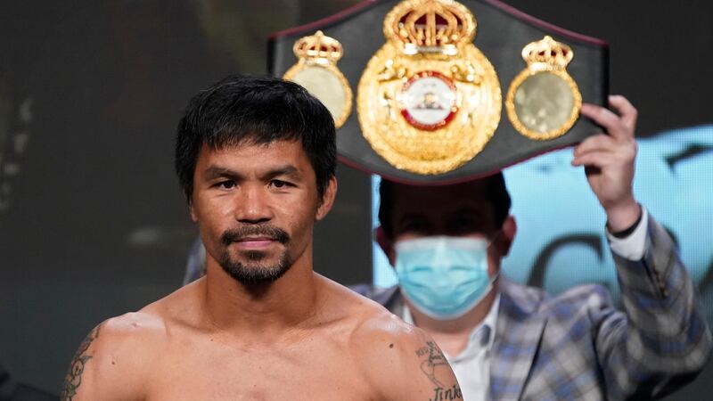 FILE - In this Aug. 20, 2021 file photo, Manny Pacquiao, of the Philippines, poses for...