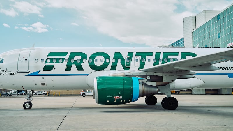 Frontier Airlines planes taxi at Denver International Airport in Denver, Colorado, Tuesday,...