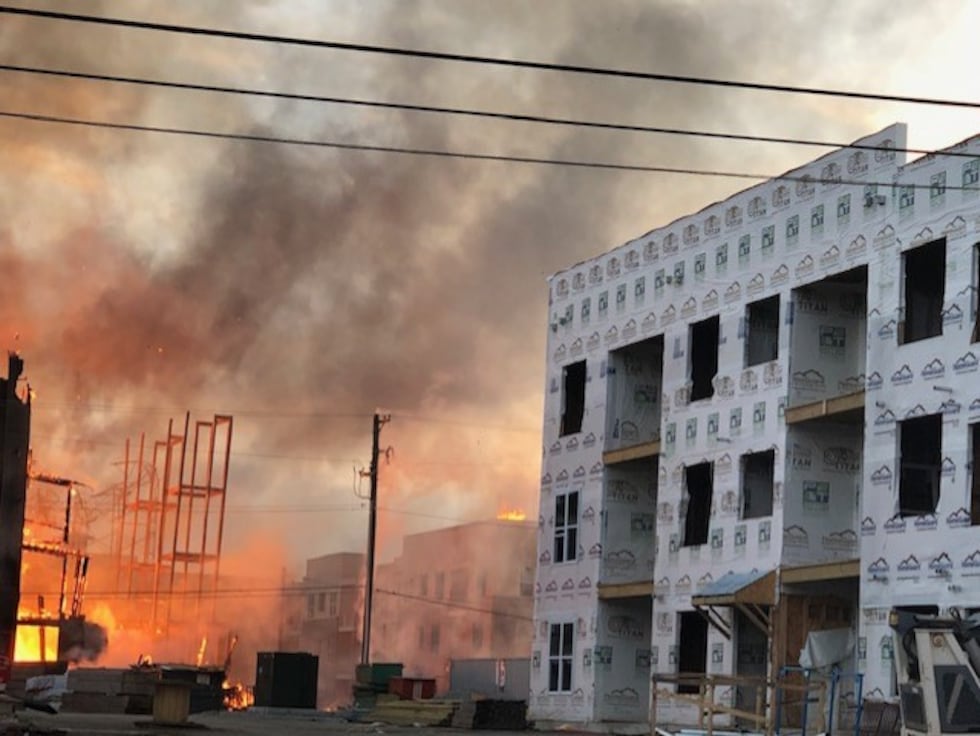 Massive Fire In Building Massive fire breaks out at construction site at downtown apartment building