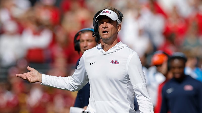 Mississippi head coach Lane Kiffin looks at the video board after a play against Oklahoma...