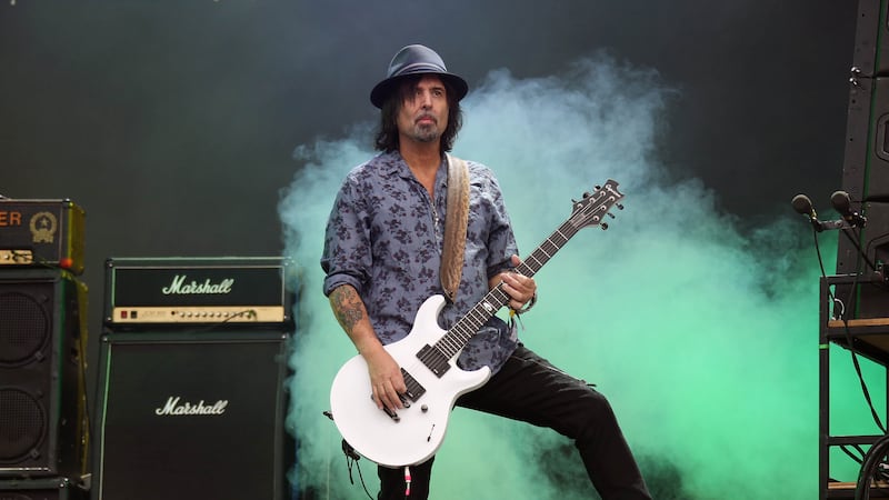 Motorhead lead guitarist Phil Campbell performs on the Pyramid stage during Glastonbury Music...