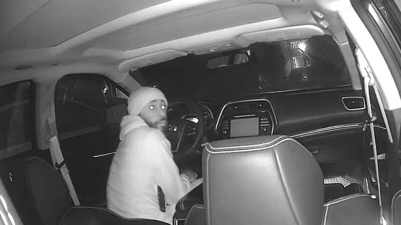 Caught on camera: Suspect breaks into car outside apartment complex, police say