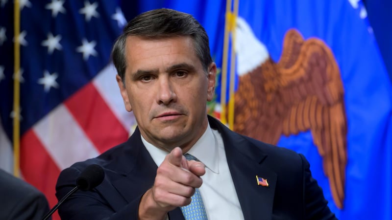 The United States Attorney General, along with several other law enforcement officials and...