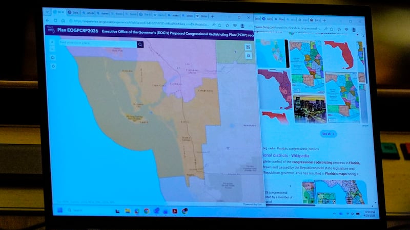 A state Senators laptop displays a proposed Congressional Redistricting Plan during debate on...