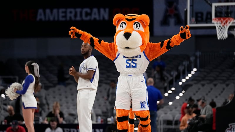 The Memphis mascot, Pouncer, motivates fans during an NCAA college basketball game against...