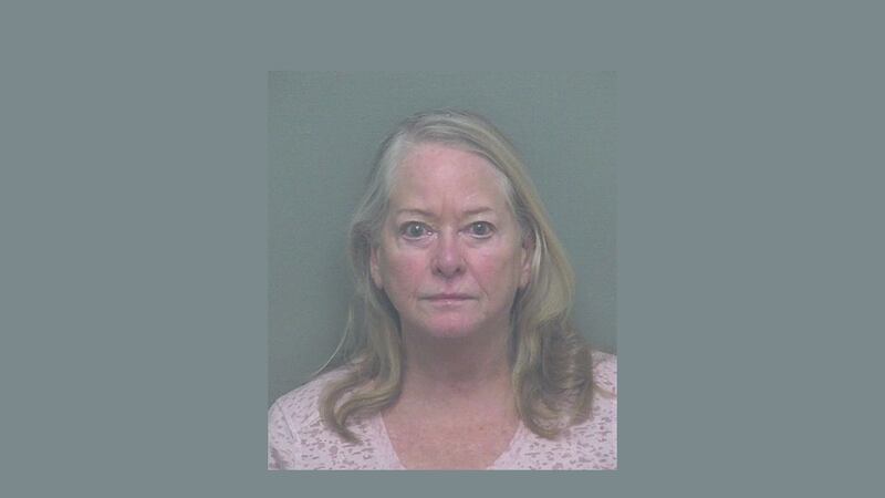 Authorities say 71-year-old Helen Litchfield is charged with three counts of kidnapping, three...